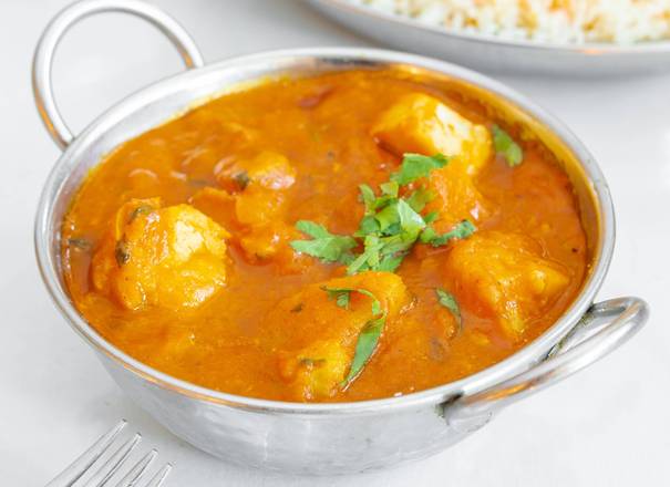 India Quality Restaurant signature dishes Chicken Tikka MasalaSaag PaneerSpinach Poori Bread